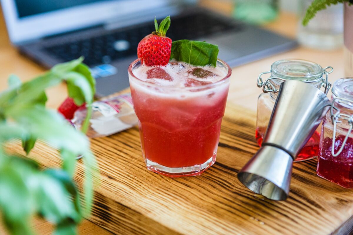 Wimbledon Drinks 2 strawberry shake on clear drinking glass