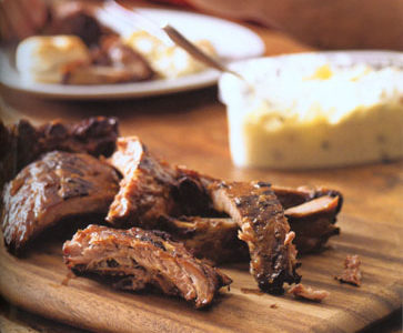 ribs on cutting board; grilled ribs recipe concept