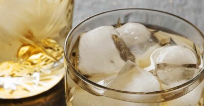 The overtime cocktail with Jameson whisky in a highball glass filled with ice