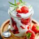 Wimbledon strawberries and cream in a mason jar