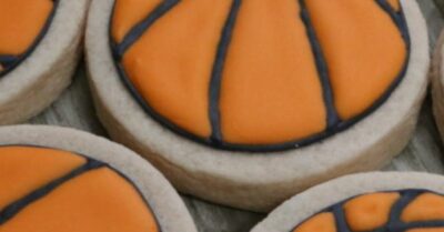 A bunch of basketball sugar cookies.