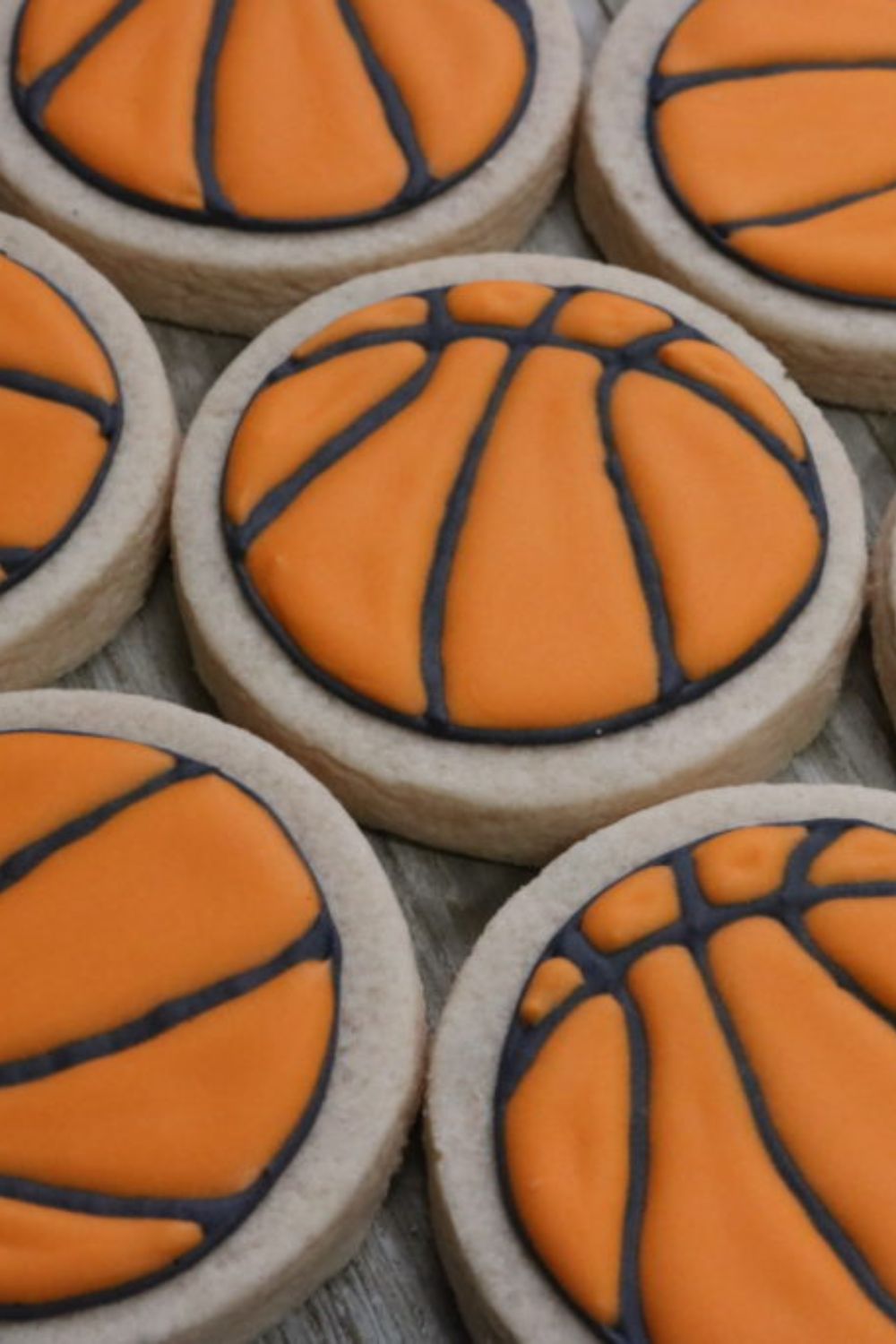 A bunch of basketball sugar cookies.