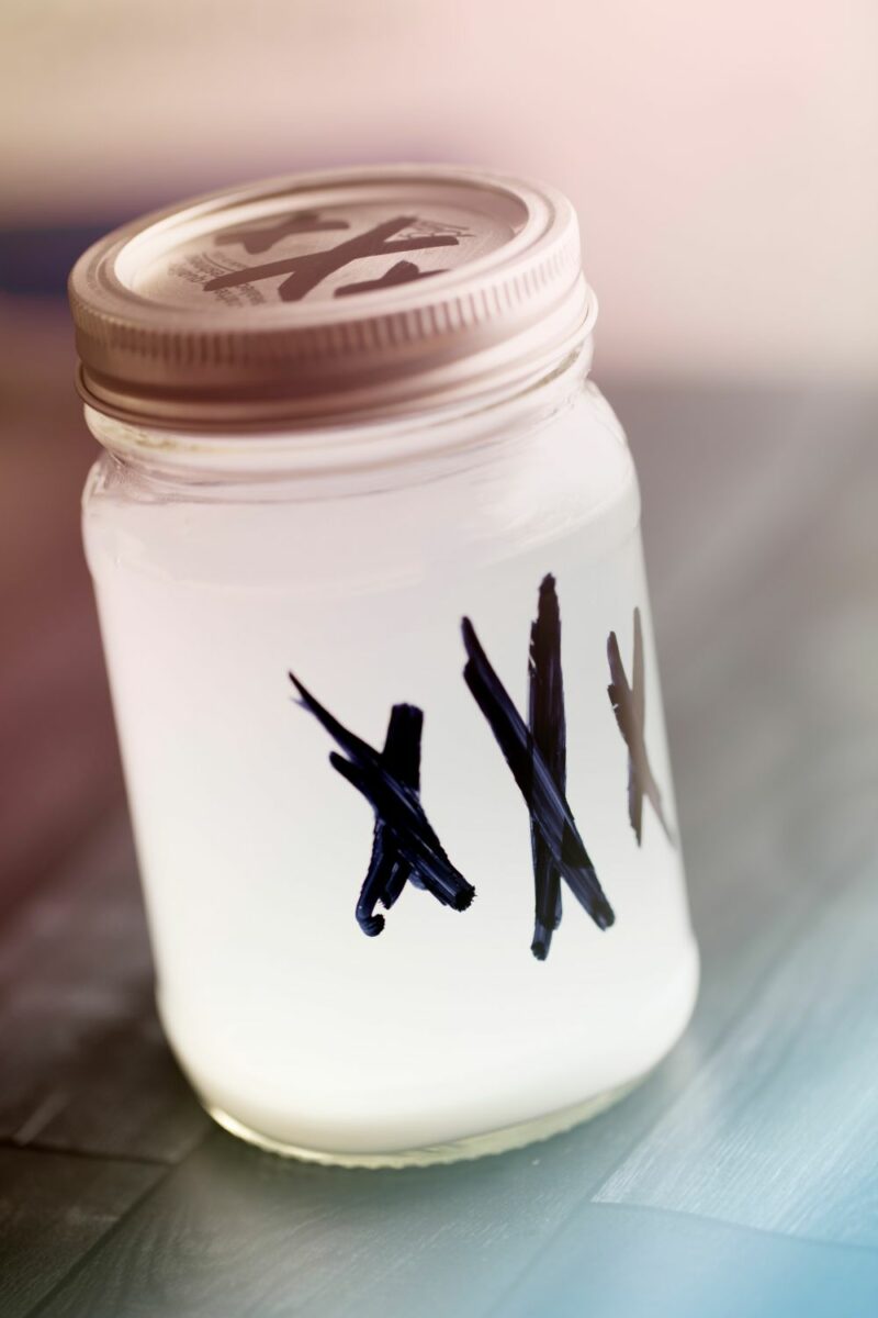 Watermelon Moonshine Recipe 3 Leftover moonshine in a mason jar labeled with three X's