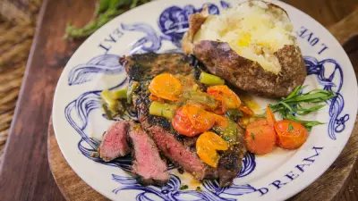 Tessemae’s Garlic Rubbed Steaks with Melted Tomatoes and a Braveheart Cocktail