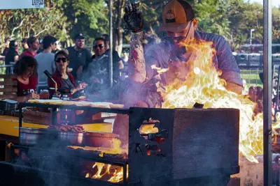 Election Day Top 5: Polling places and other wacky tailgating venues 5 Man grilling in the park with family and friends
