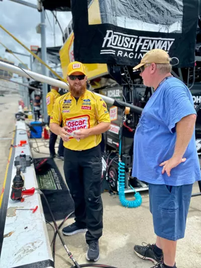 NASCAR Camping: The Perfect Family Tailgating Weekend 10 Atlanta Motor Speedway chatting on pit row