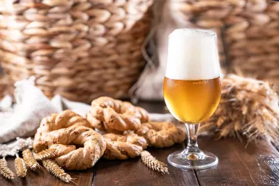 24 Holiday Beers To Serve At Your Next Homegate 4 bigstock Pouring Beer Into The Glass W 462406809