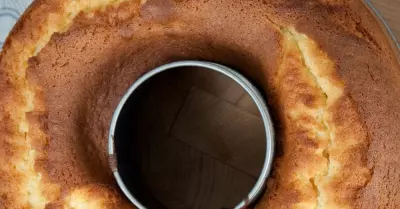 A circular pound cake on parchment paper
