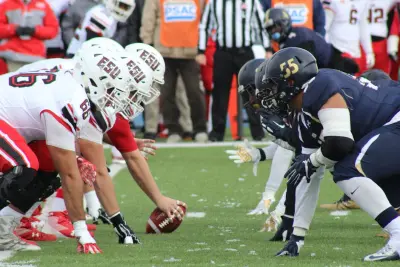 How to Tailgate this Football Season During COVID-19 1 Two football teams on the field